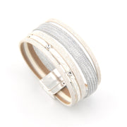 Bracelet with textured band and small diamonds on a white background