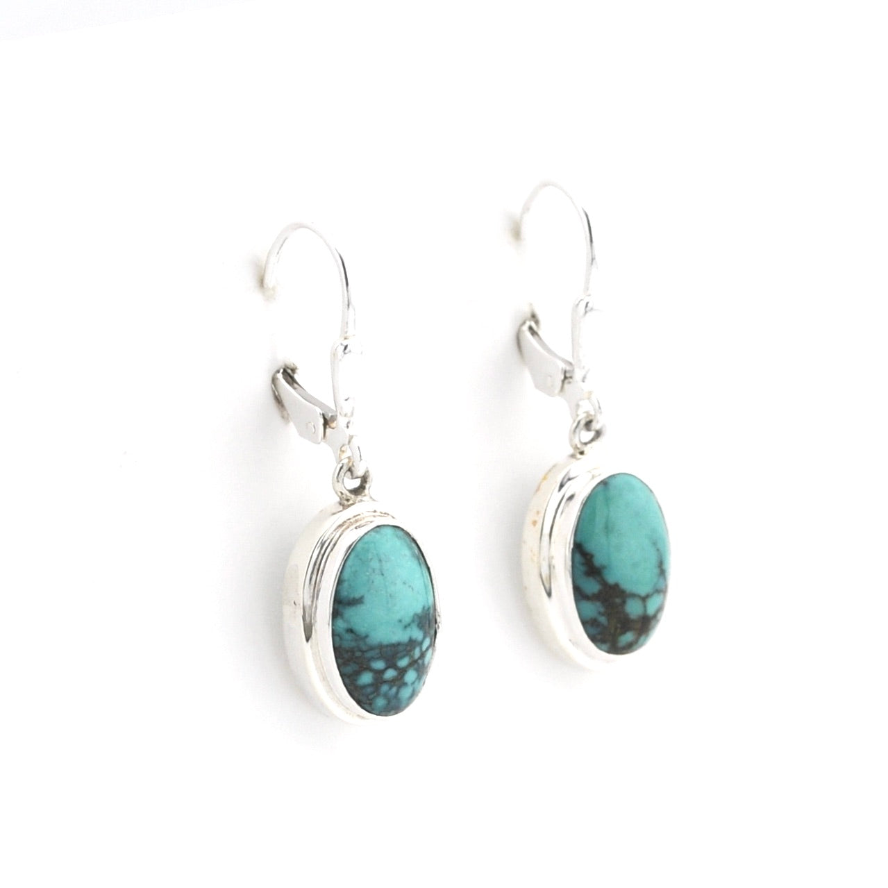 Silver Turquoise Oval Dangle Earrings on white background