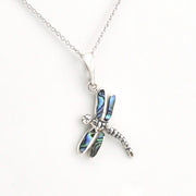Silver dragonfly pendant with inlaid abalone shell on silver chain.