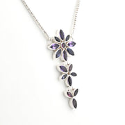 Handmade Sterling Silver Amethyst Iolite Rhodolite Flower Necklace on white bcakground