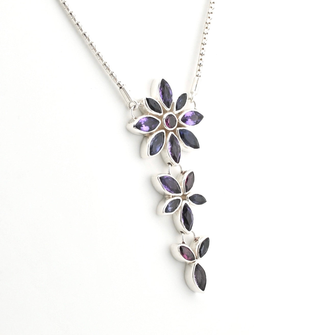 Handmade Sterling Silver Amethyst Iolite Rhodolite Flower Necklace on white bcakground