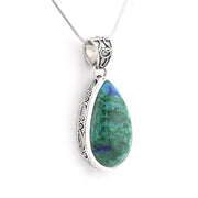 A silver teardrop pendant necklace featuring a green and blue marbled stone, suspended from a delicate silver chain against a plain white background.