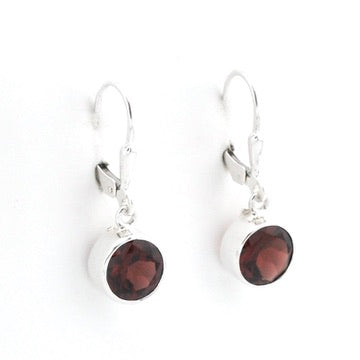 A pair of silver leverback earrings with round dark brown gemstone drops, shown on a plain white background.