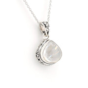 A silver pendant necklace featuring a teardrop-shaped iridescent white gemstone in a detailed silver bezel setting, suspended from a delicate silver chain against a plain white background.