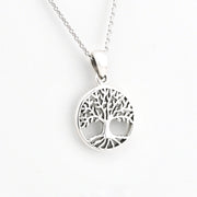Silver tree of life pendant on a white background