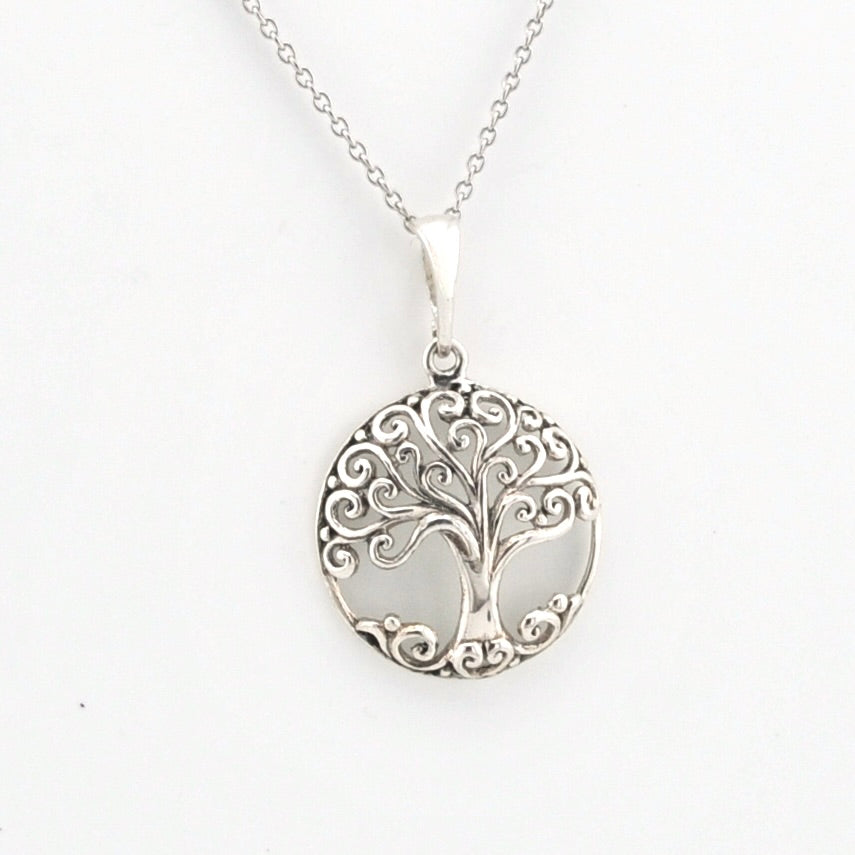 A silver tree of life pendant necklace on a delicate silver chain, displayed against a clean white background.