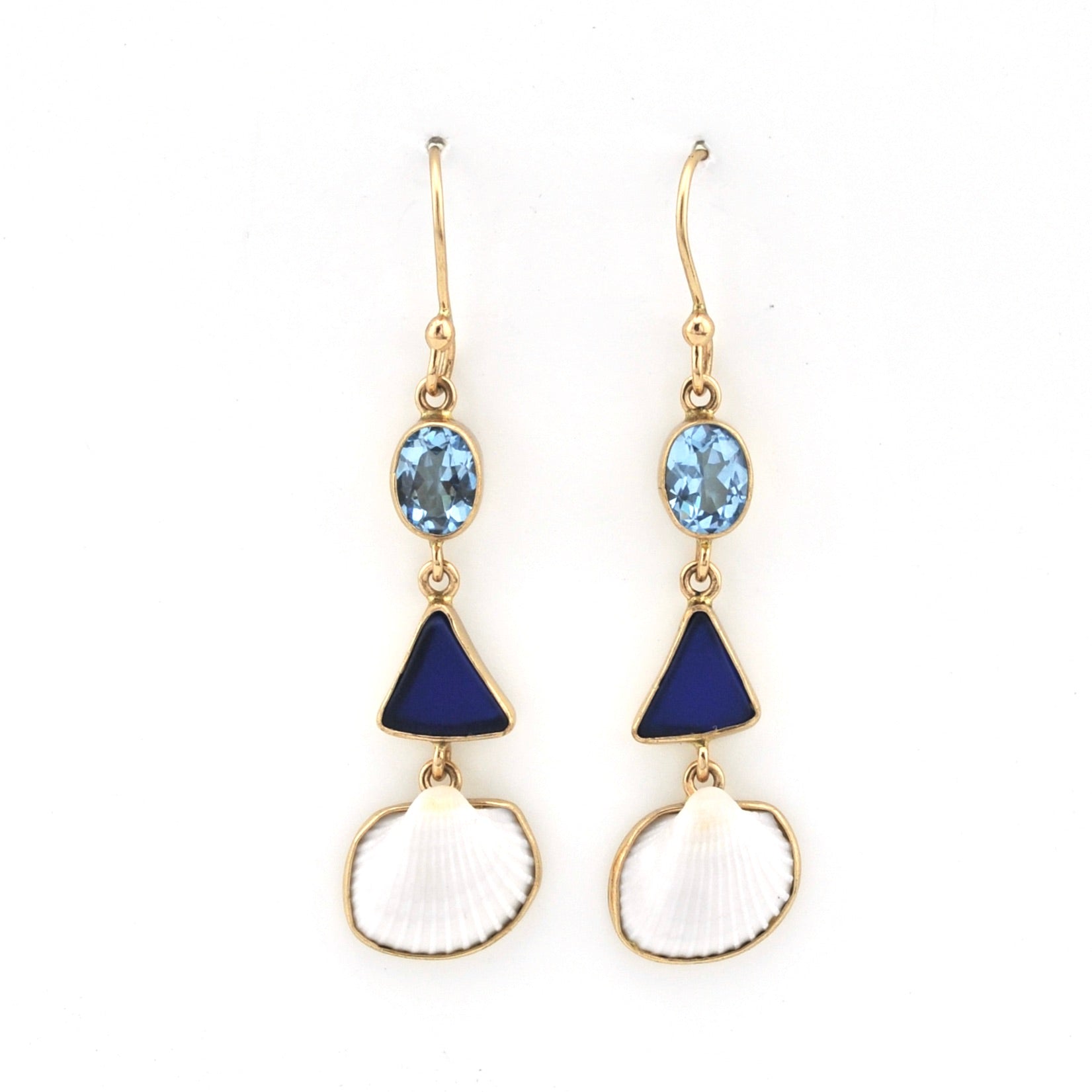 Pair of earrings with blue gemstones and gold accents on a white background