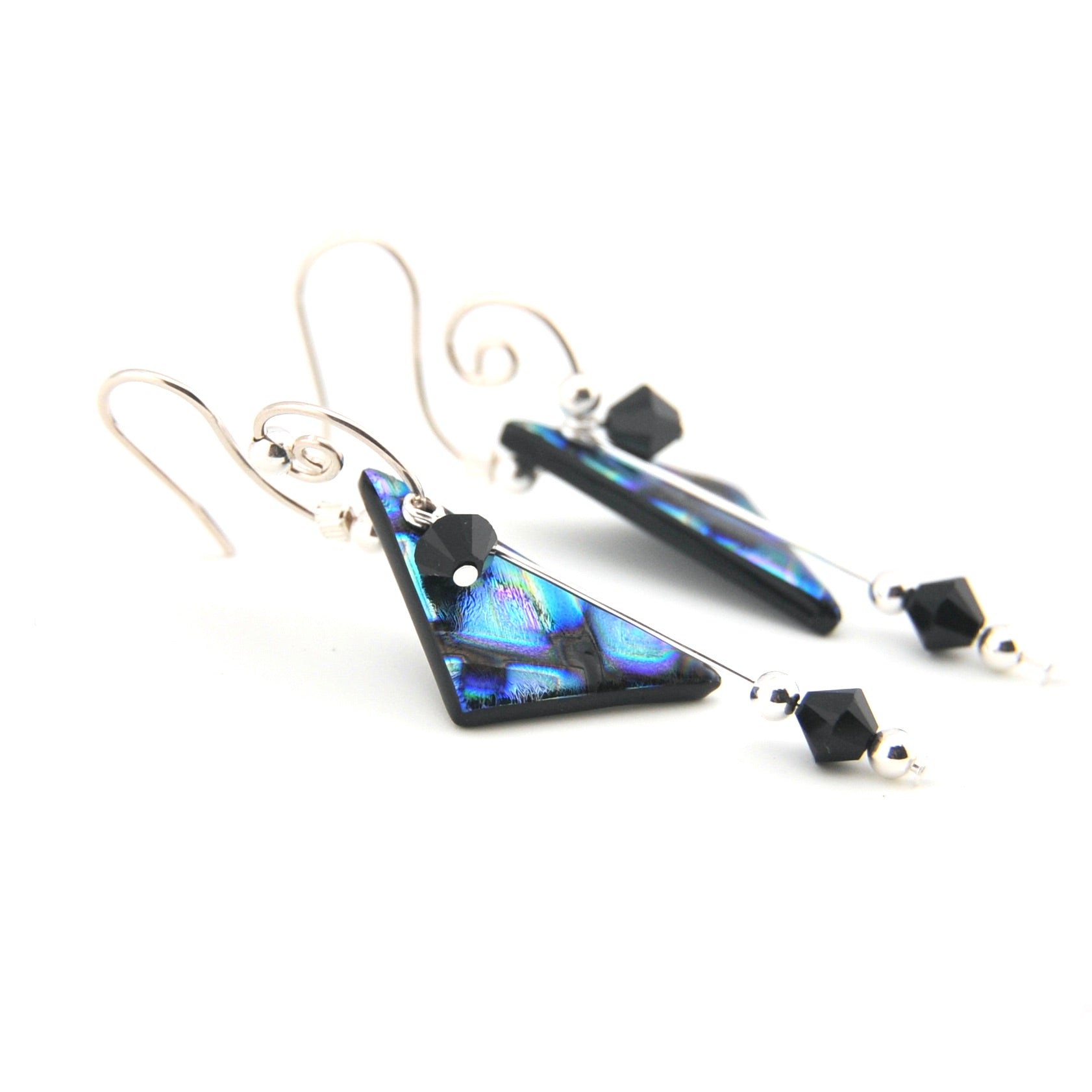Pair of triangle-shaped earrings with blue and black design on a white background