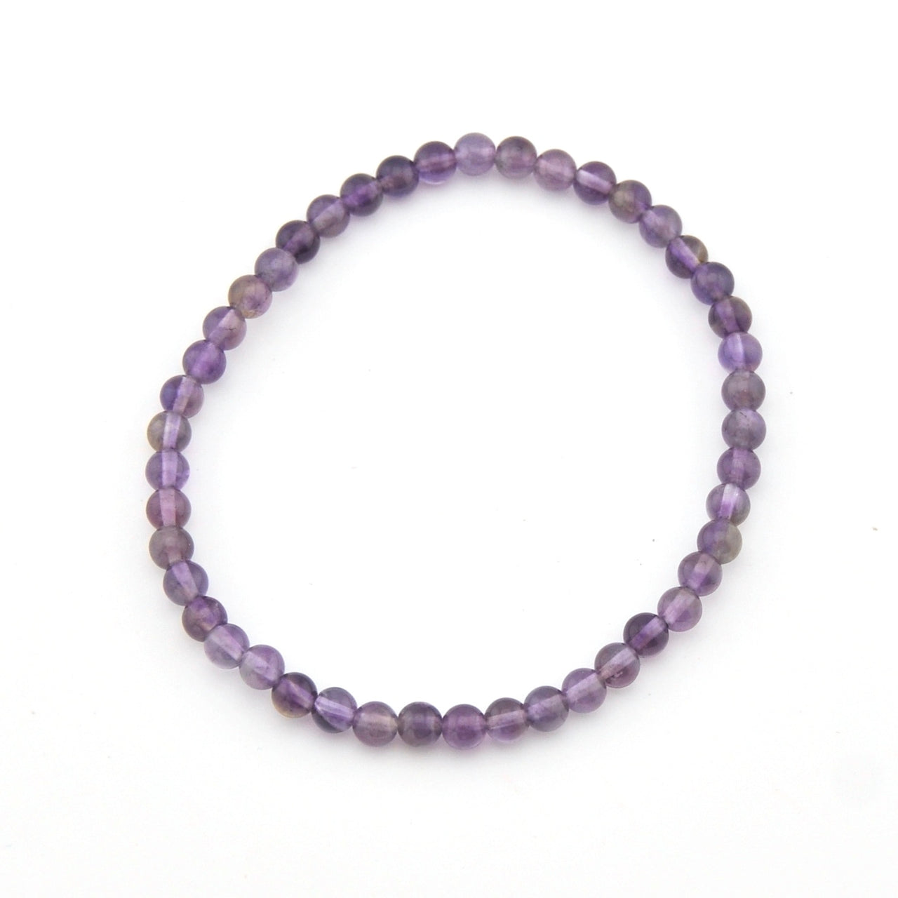 Purple beaded bracelet on a white background