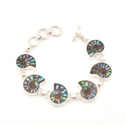 Bracelet with circular, multicolored stone links on a white background