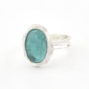 Silver ring with a Roman Glass on a white background