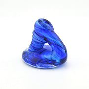 Blue glass sculpture on a white background