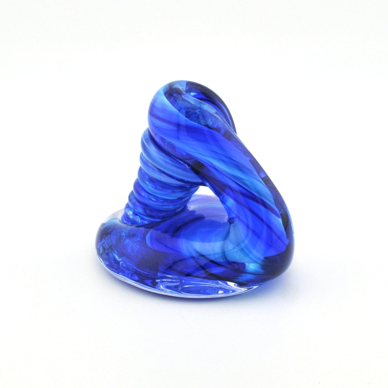 Blue glass sculpture on a white background