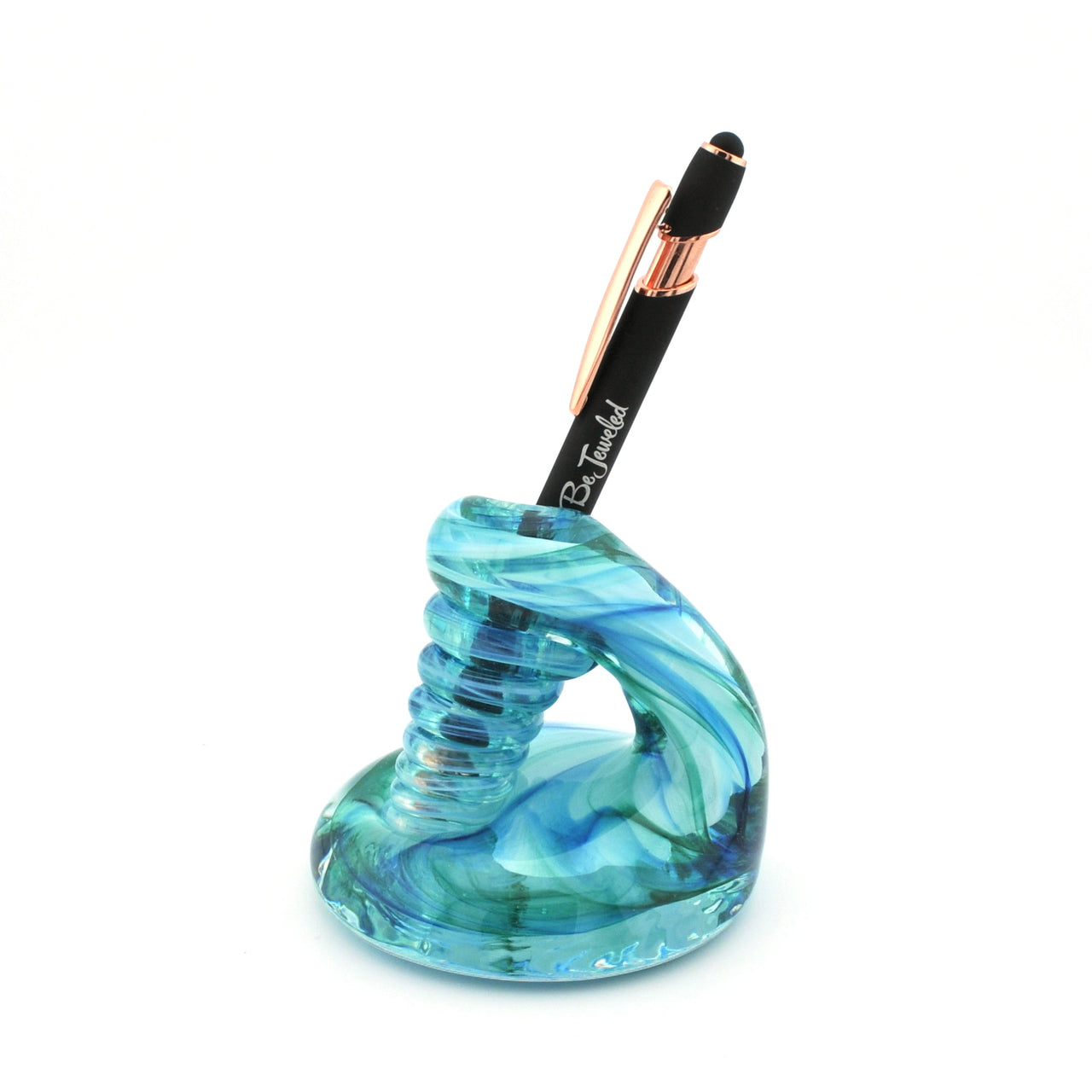 Blue glass pen holder with a pen on a white background