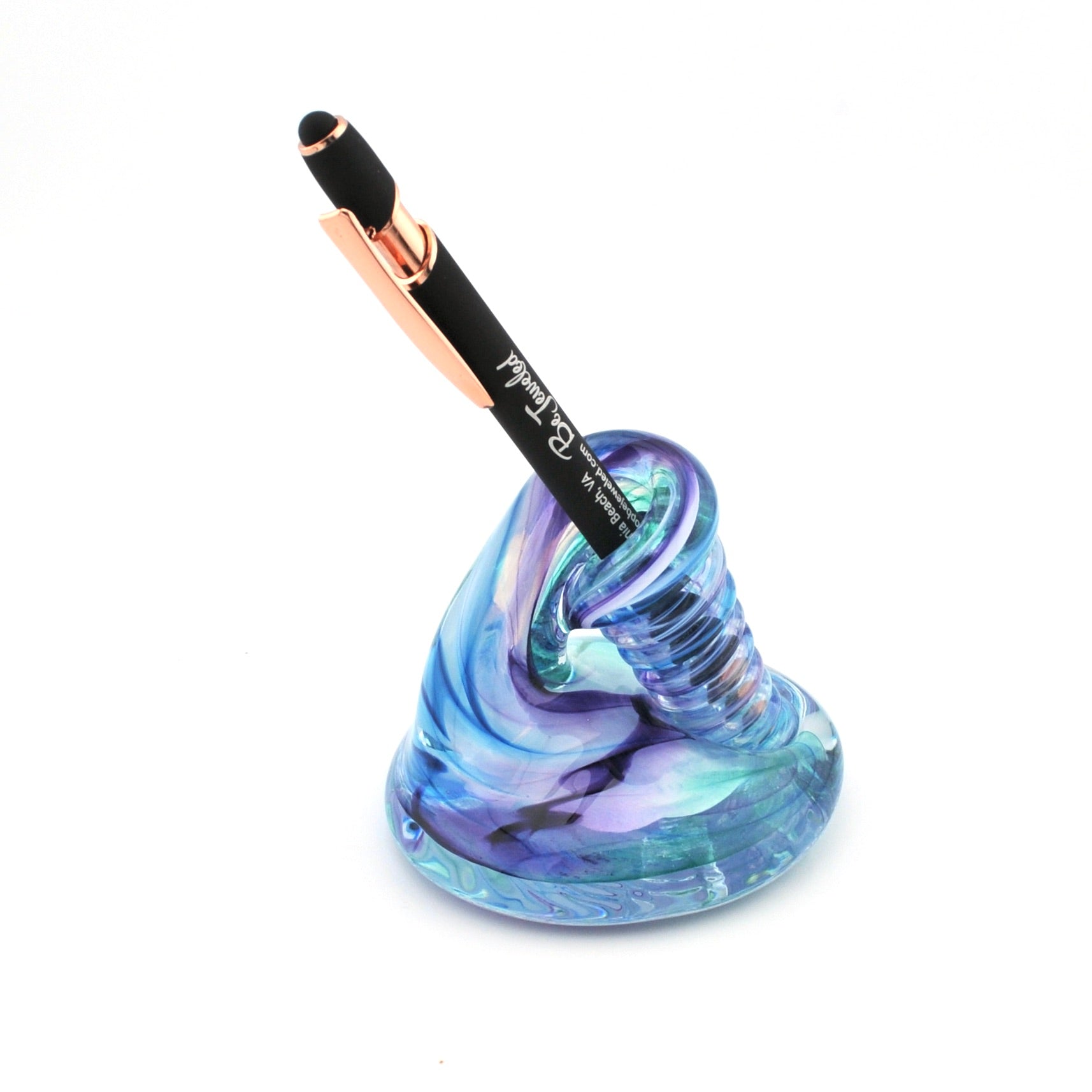Blue glass holder with a black pen on a white background