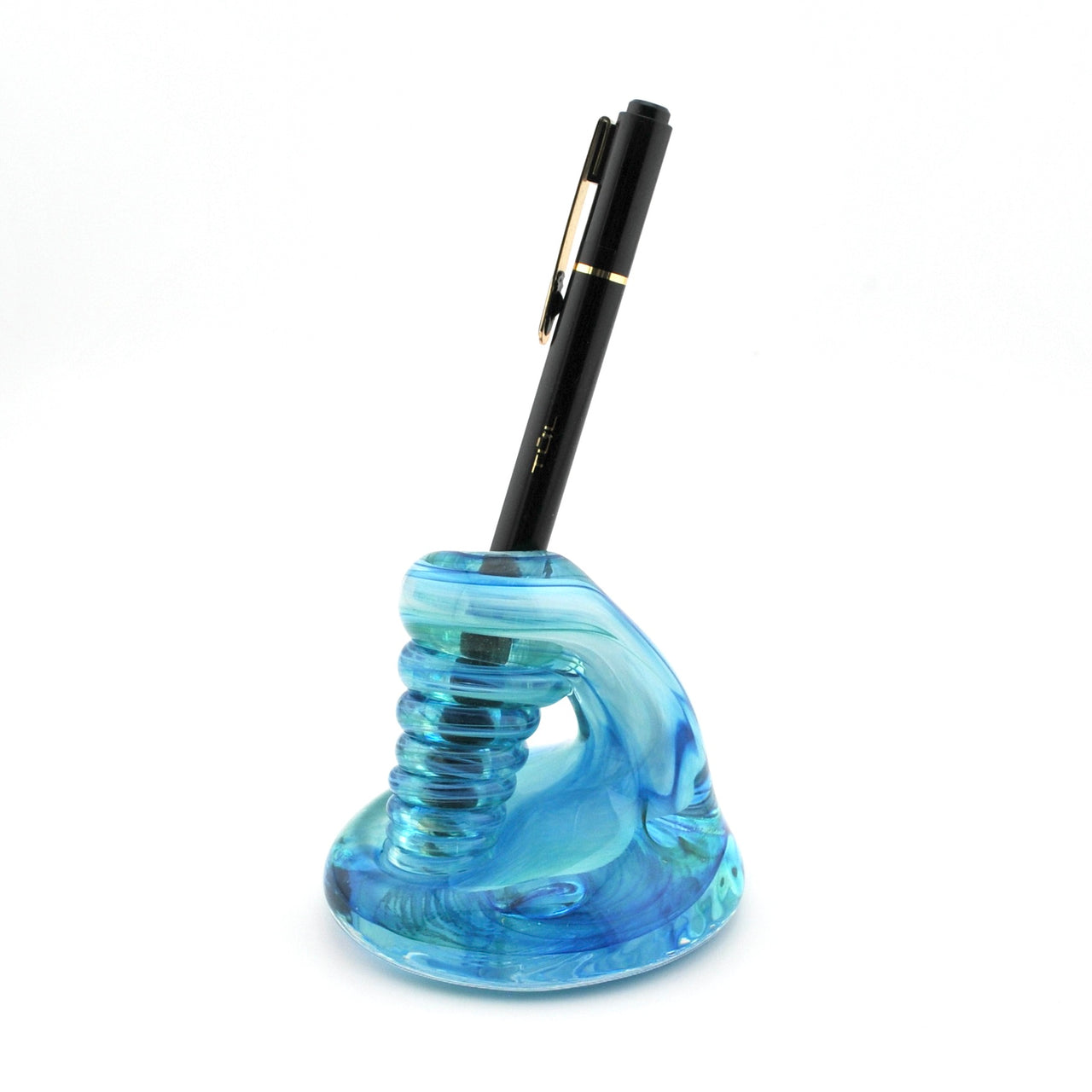 Blue glass pen holder with a black pen on a white background
