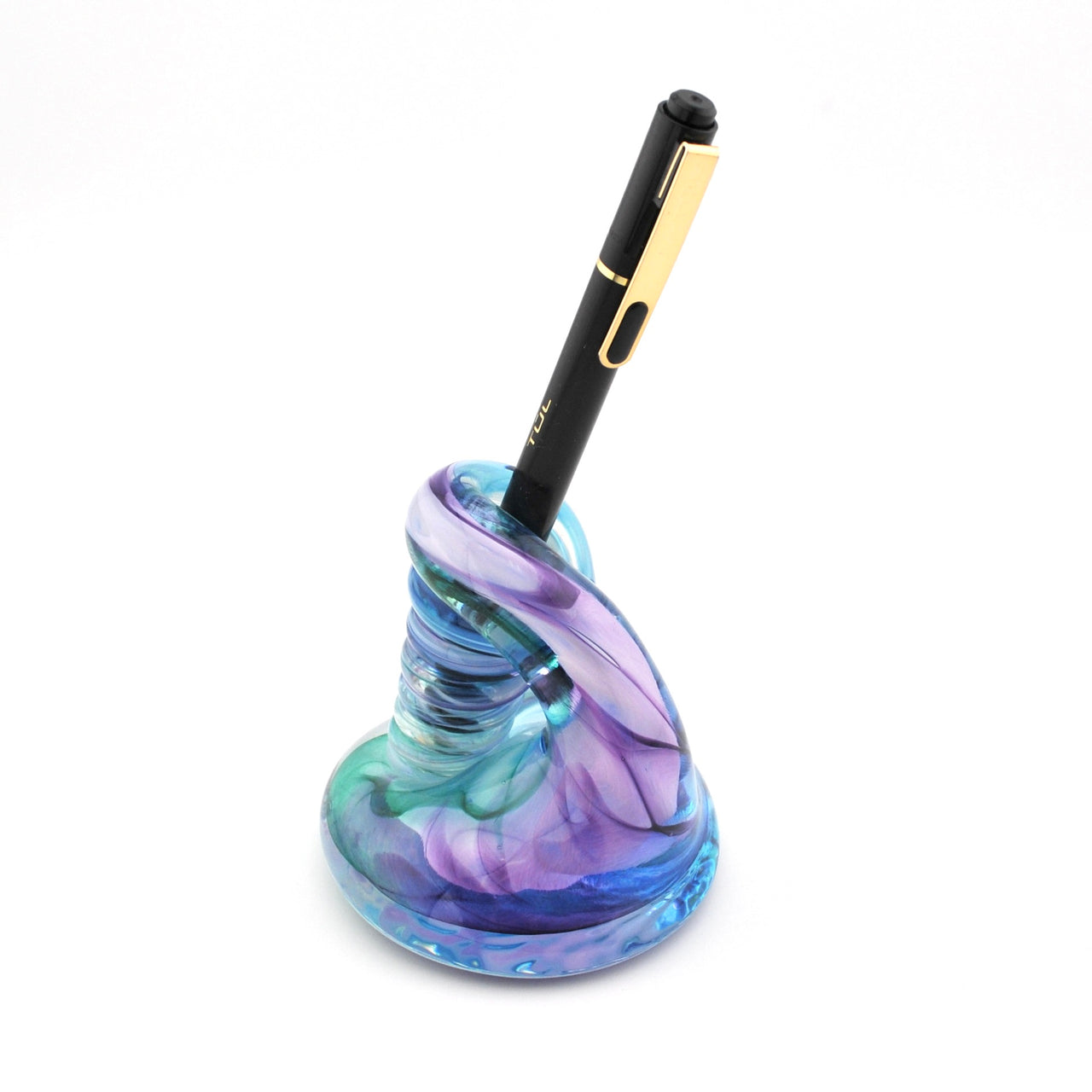 Colorful glass pen holder with a pen on a white background