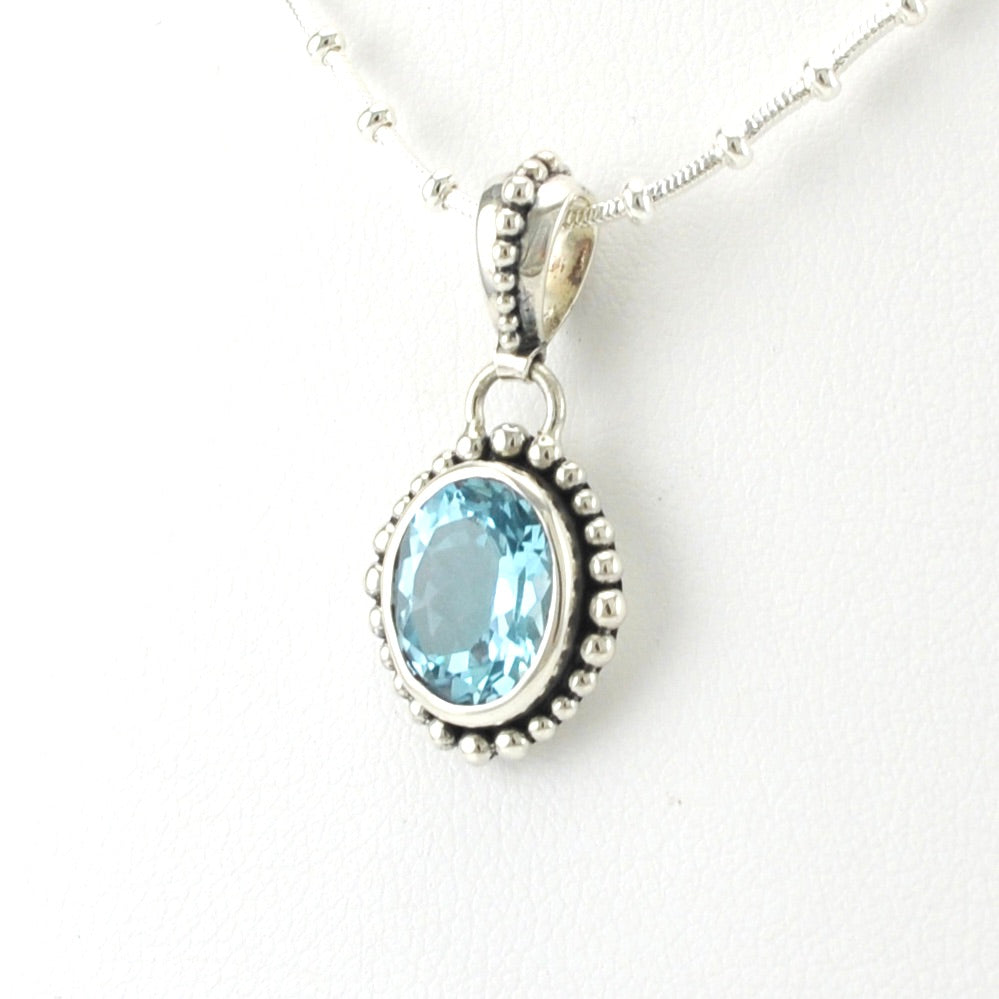 Side View Sterling Silver Blue Topaz Oval Beaded Necklace