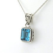 Side View Sterling Silver Blue Topaz 7x9mm Rectangle Bali Necklace
