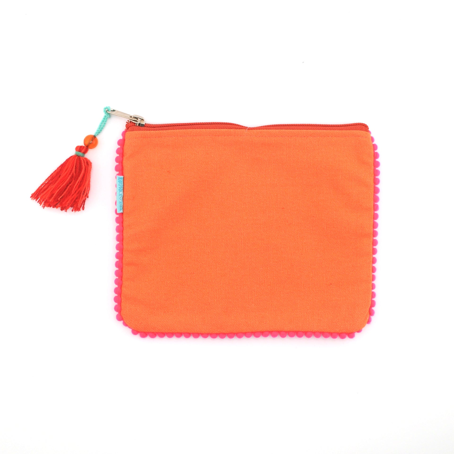 Orange pouch with pom-pom trim and tassel on a white background