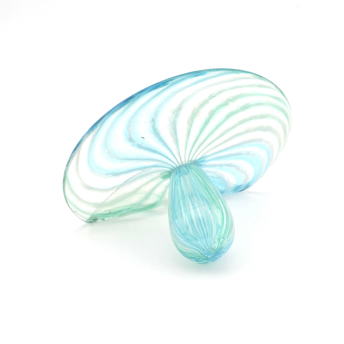 Glass sculpture with swirling pattern on a white background