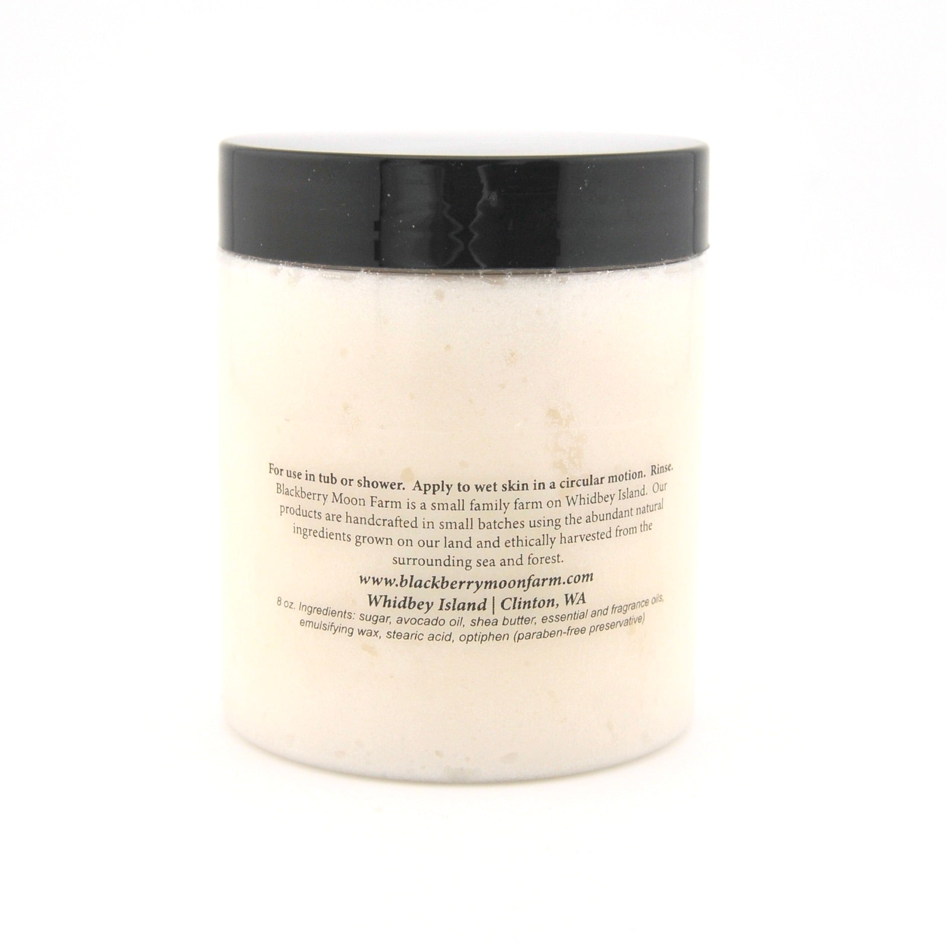 White jar with black lid on a white background