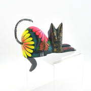 Colorful cat-shaped object on a white background