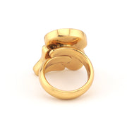 Gold ring with a unique design on a white background