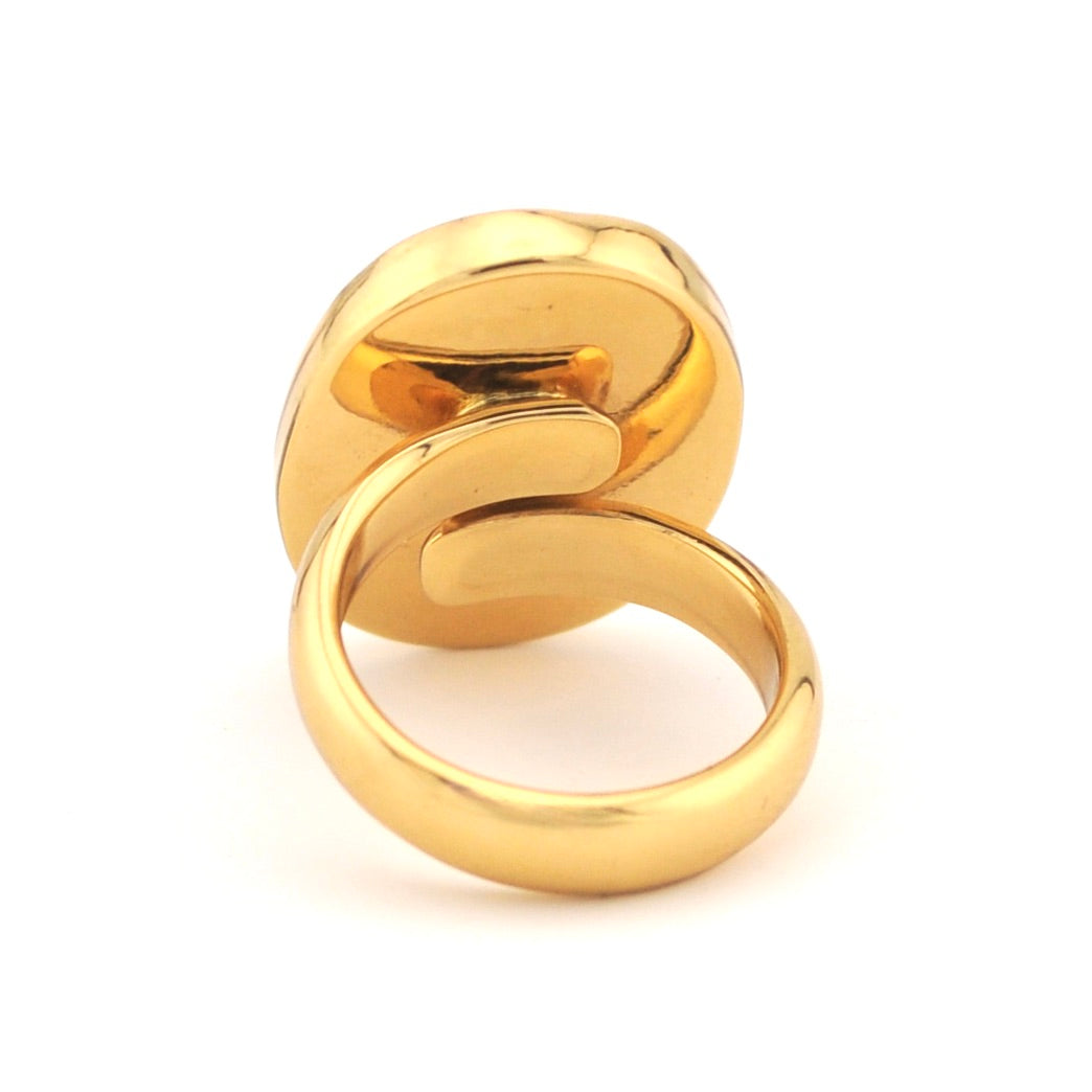 Gold ring on a white background