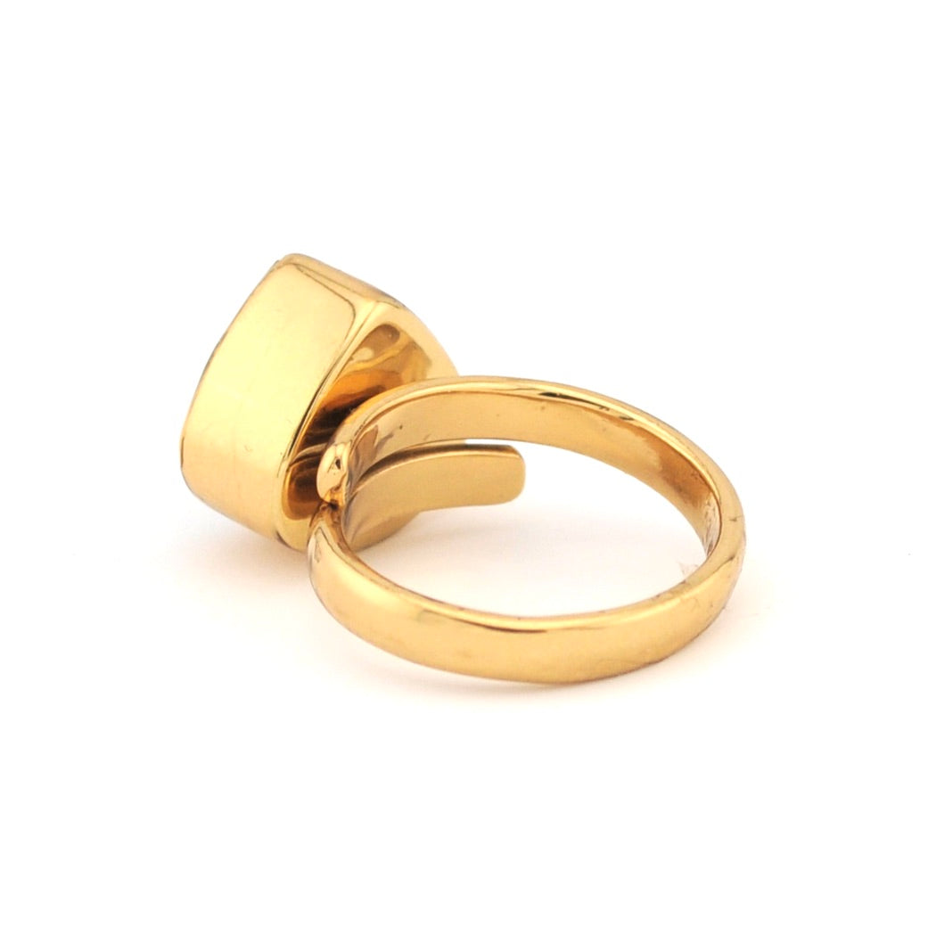 Gold ring on a white background