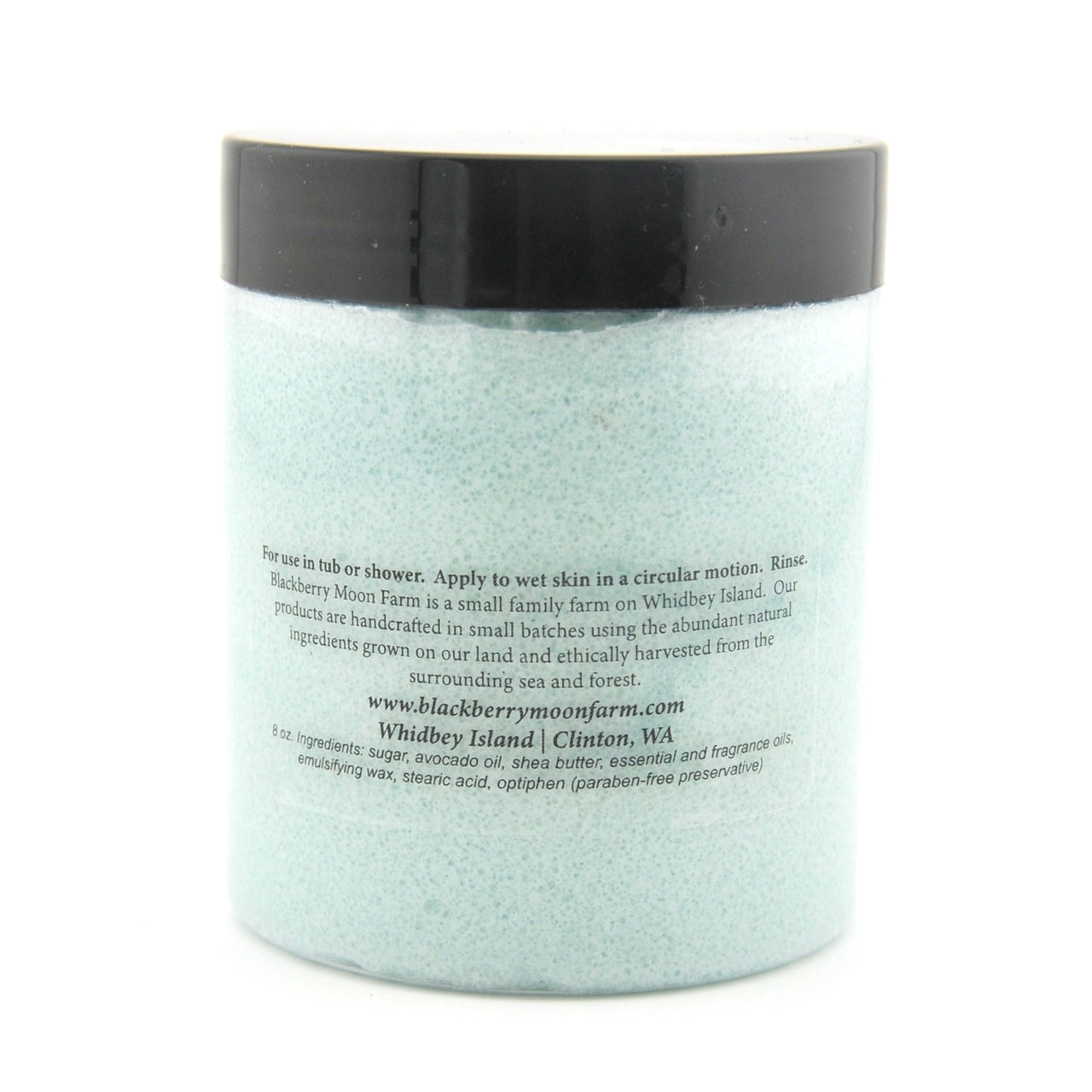 Jar of bath scrubwith a black lid on a white background