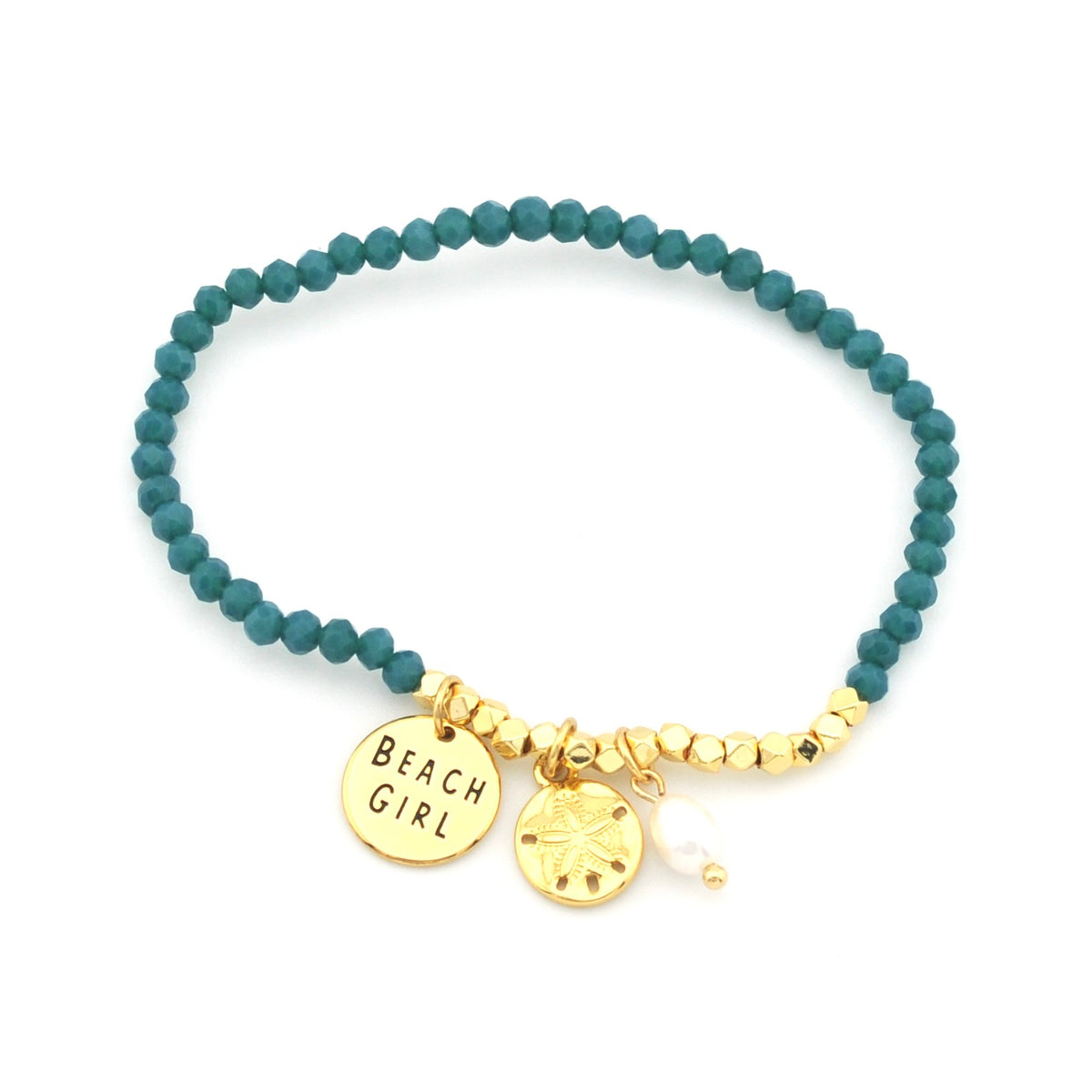 A beaded stretch bracelet with dark teal beads, gold-toned spacer beads, and three charms: a round gold disc stamped 'BEACH GIRL', a gold sand dollar charm, and a small white pearl bead.