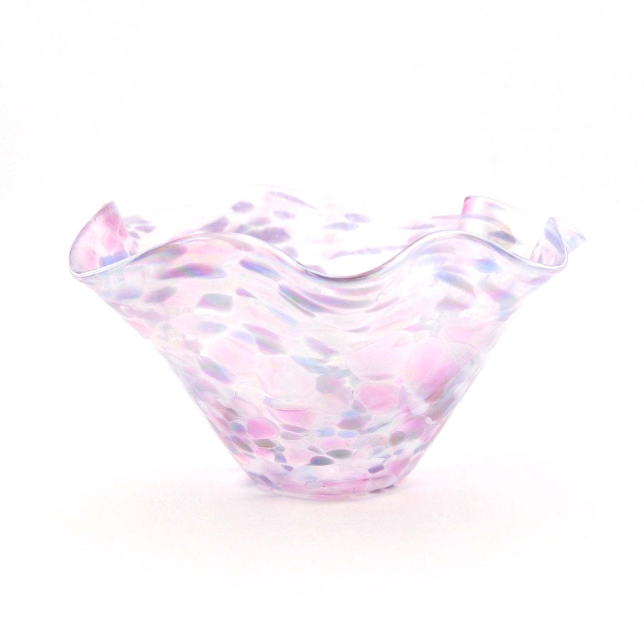 Glass bowl with wavy design and pink and blue color pattern on a white background