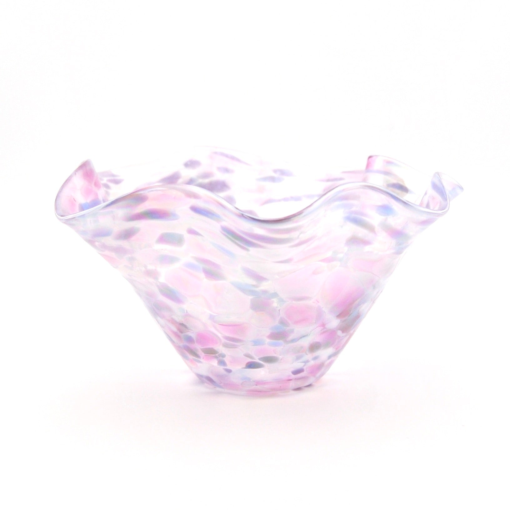 Glass bowl with wavy design and pink and blue color pattern on a white background