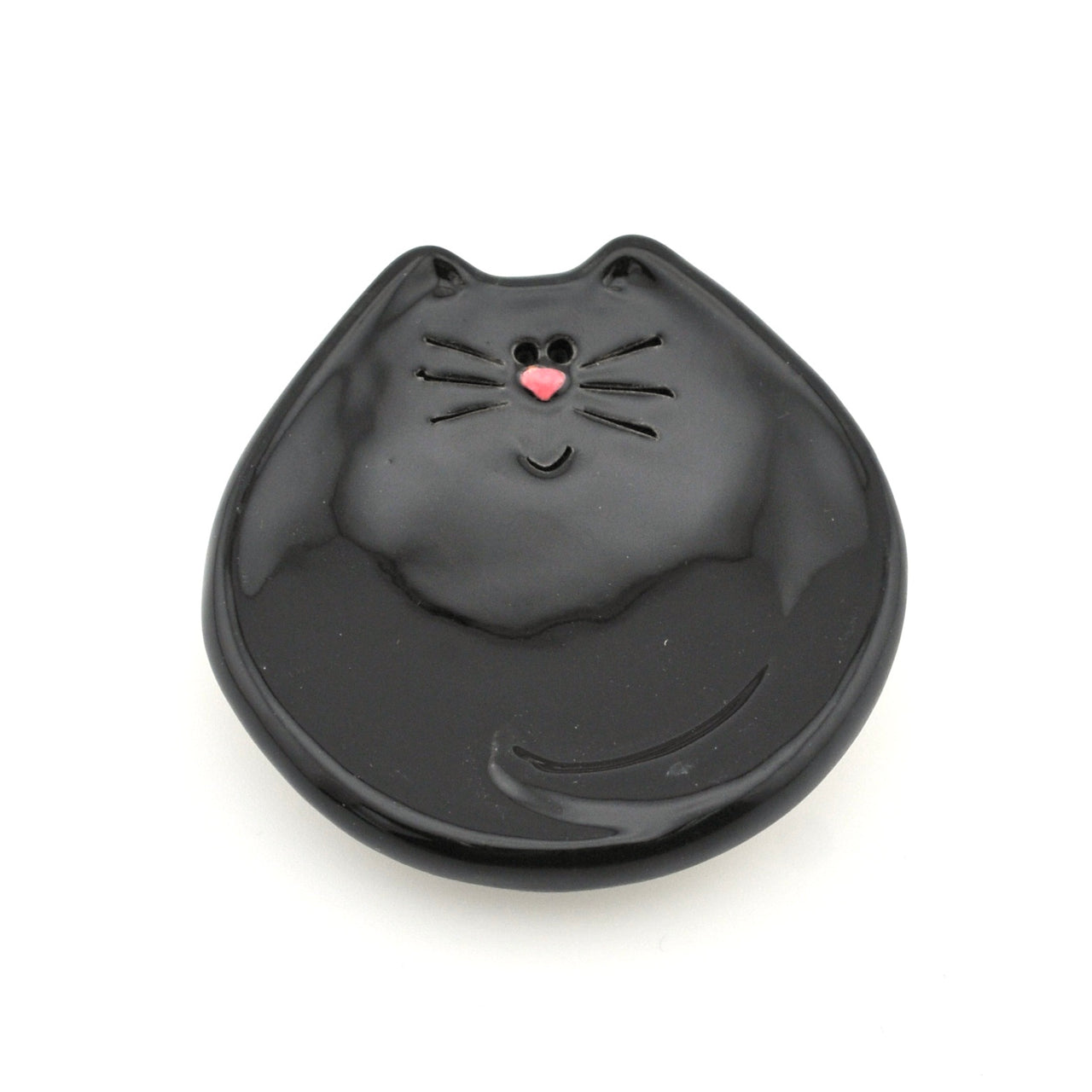 Black cat-shaped dish on a white background