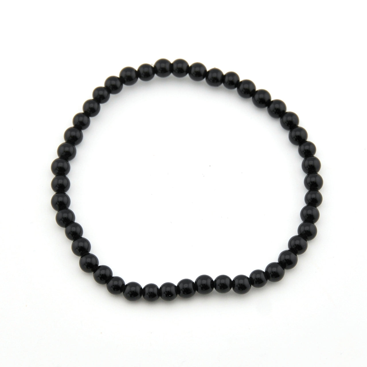 Black beaded bracelet on a white background