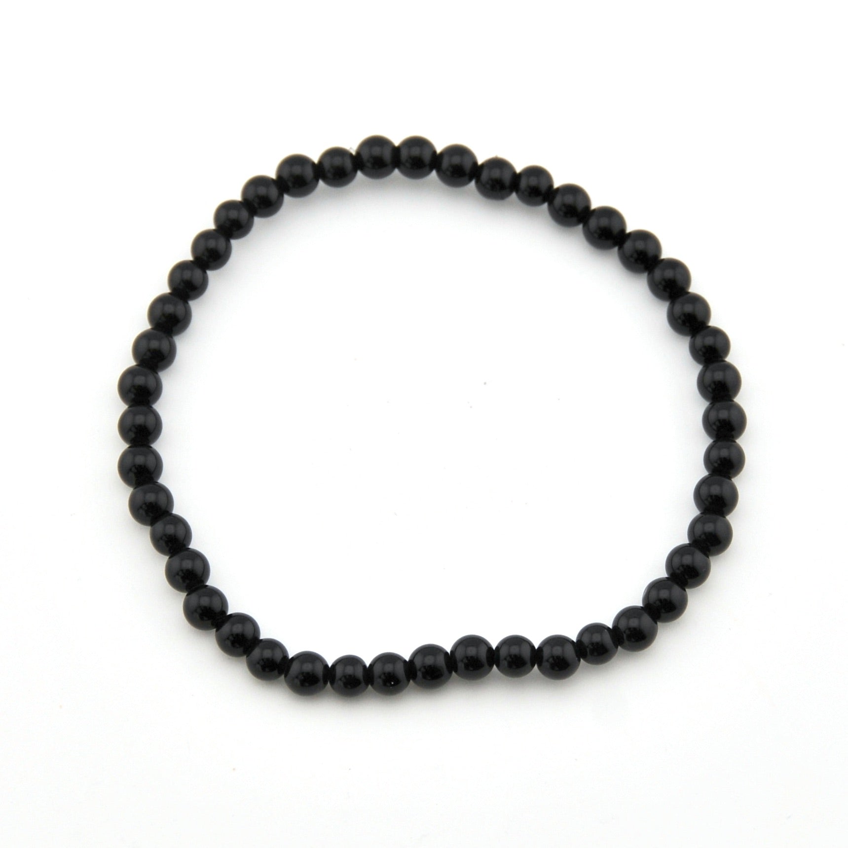 Black beaded bracelet on a white background