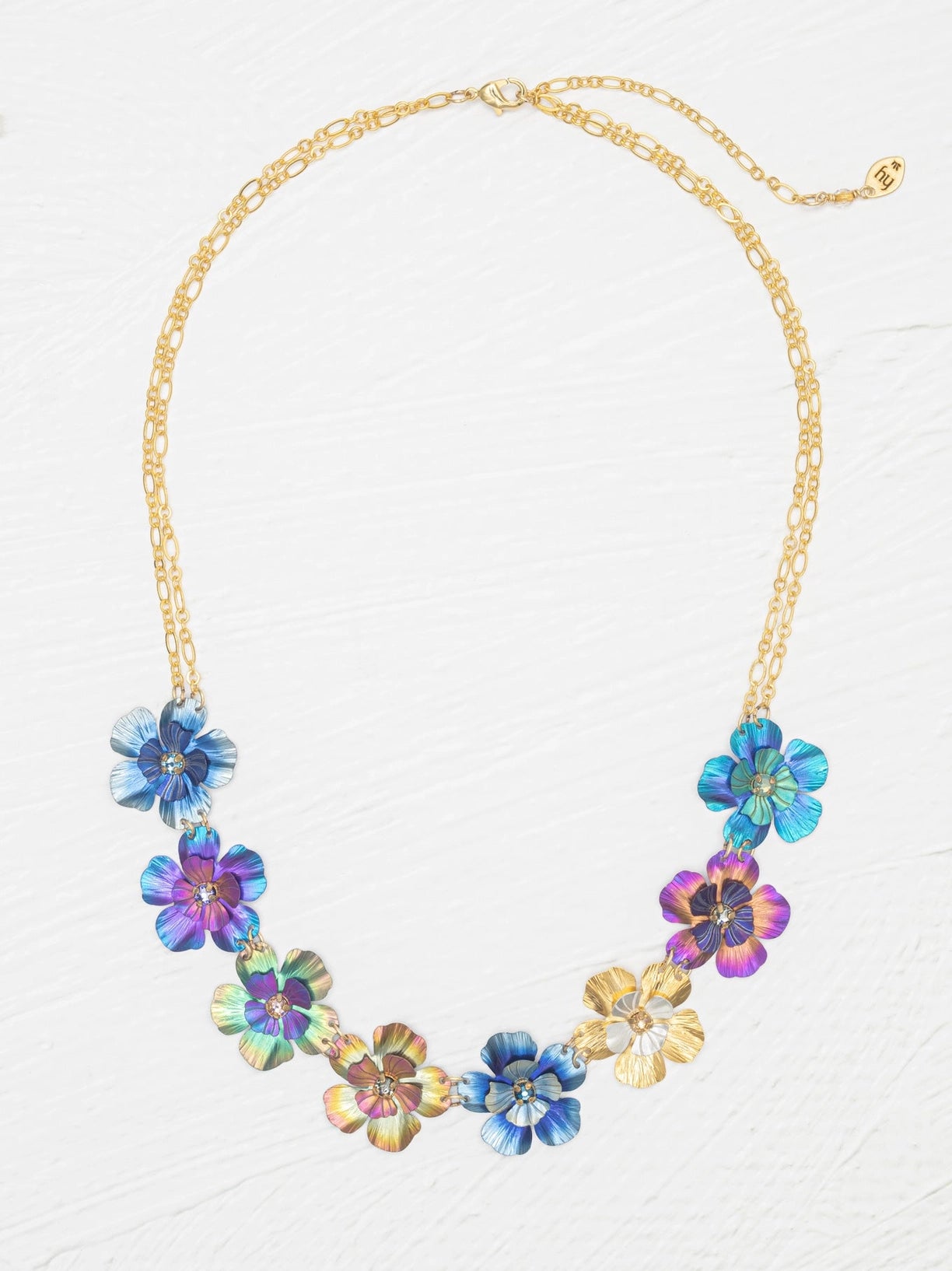 Multicolored floral necklace on a white background