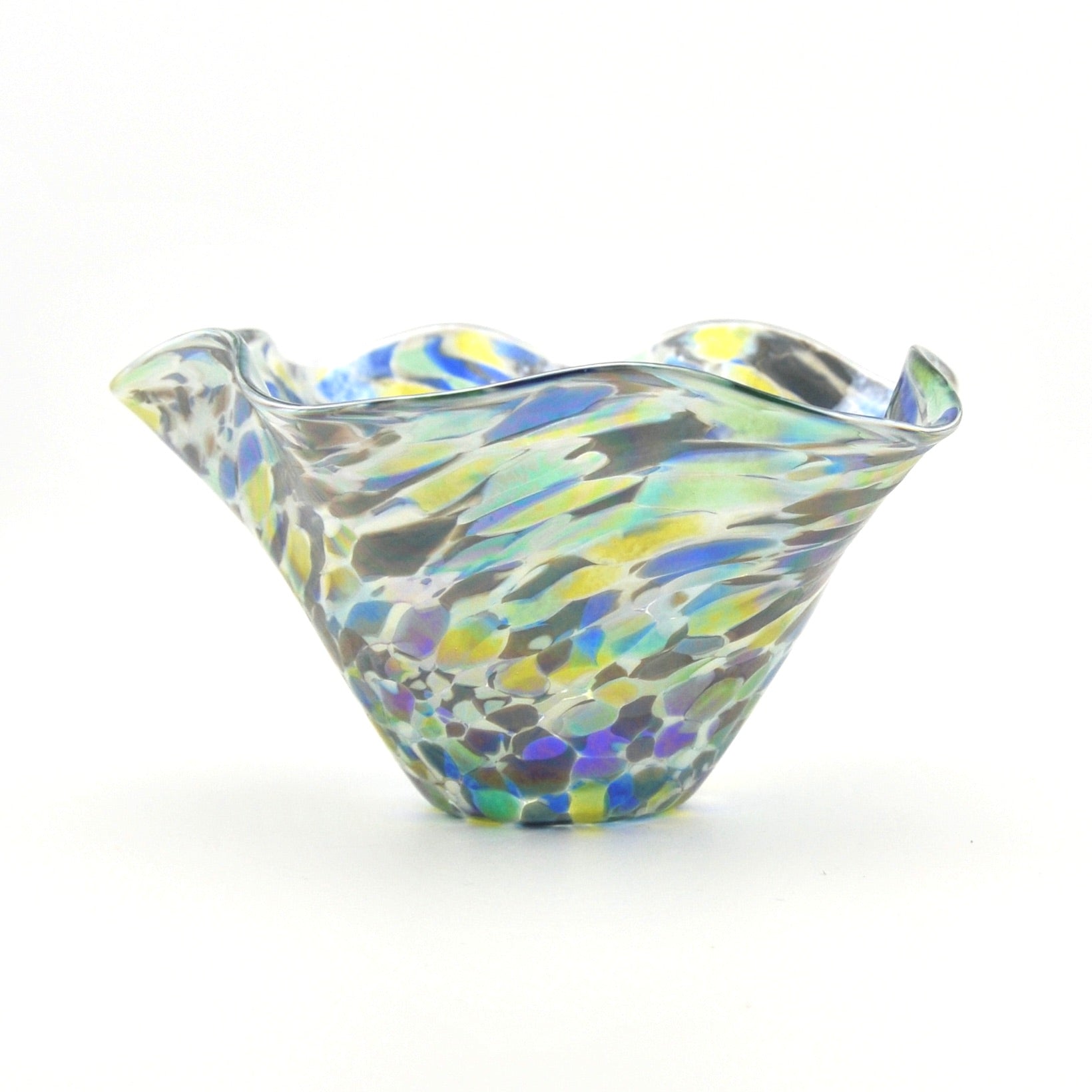 Multicolored glass bowl on a white background