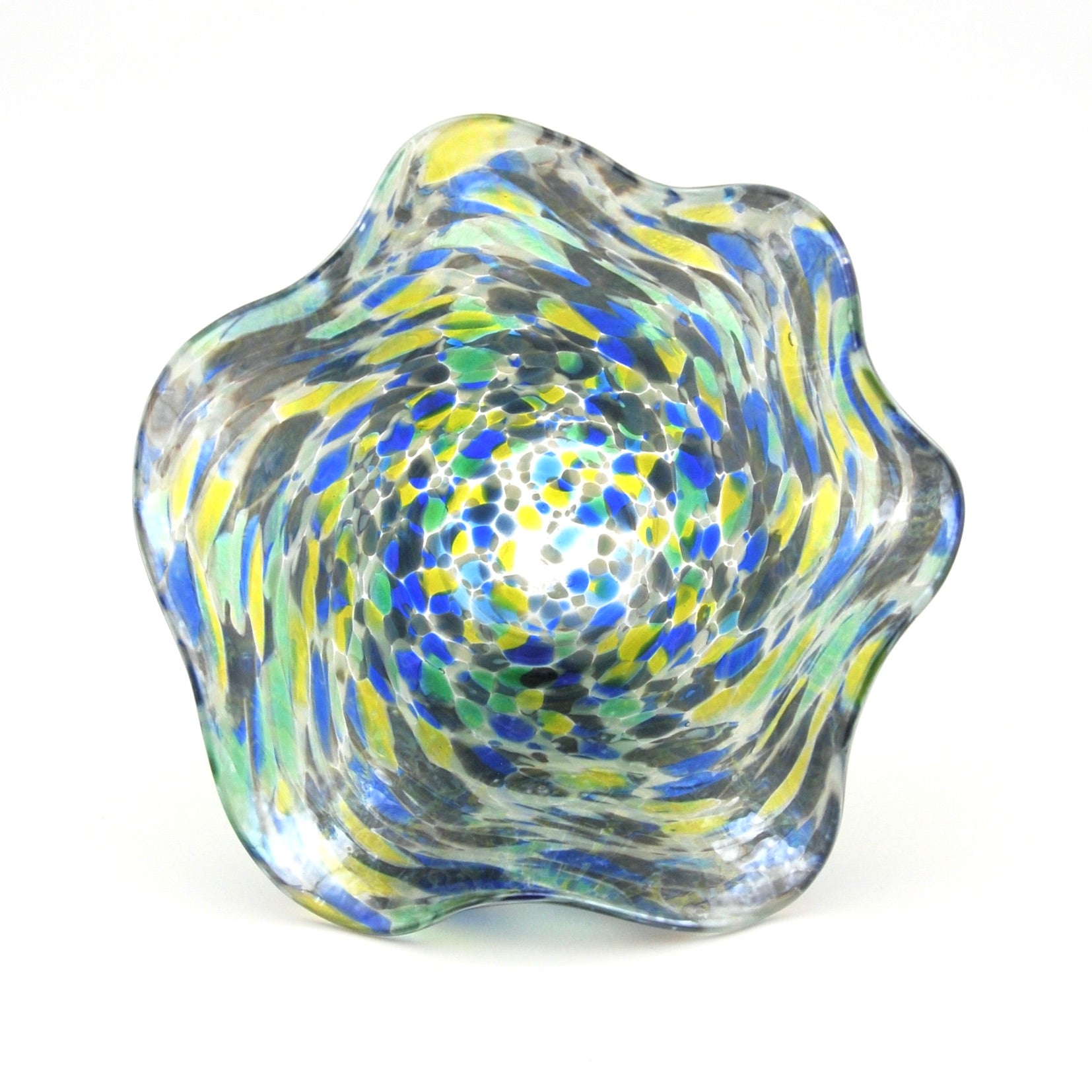 Colorful glass bowl with swirl pattern on a white background