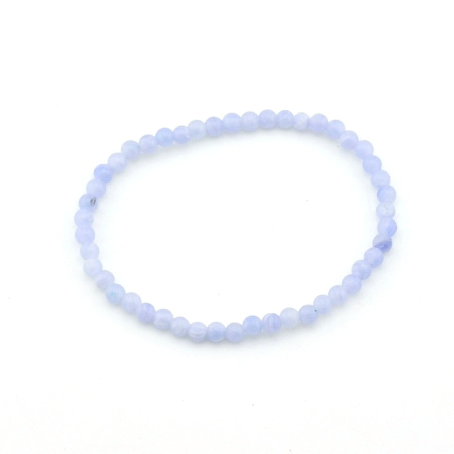 Light blue beaded bracelet on a white background