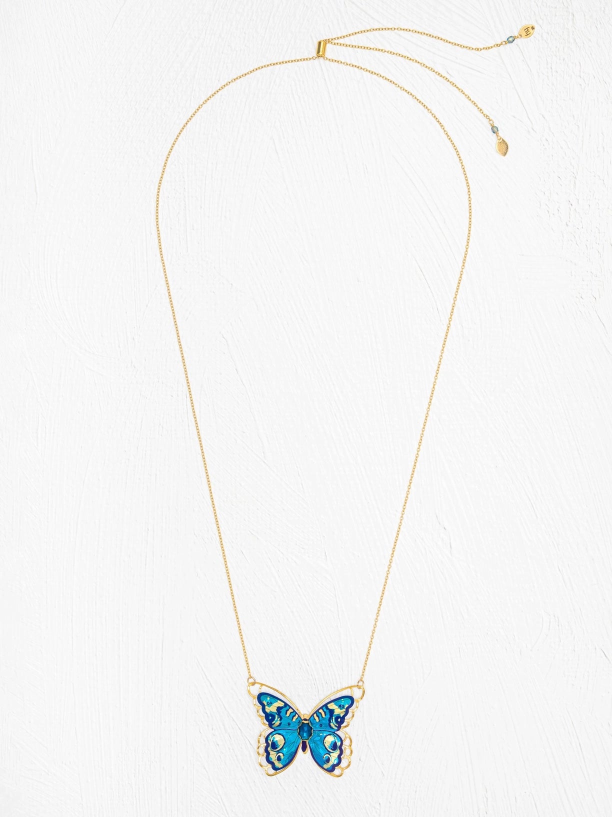 Butterfly-shaped pendant necklace on a white background