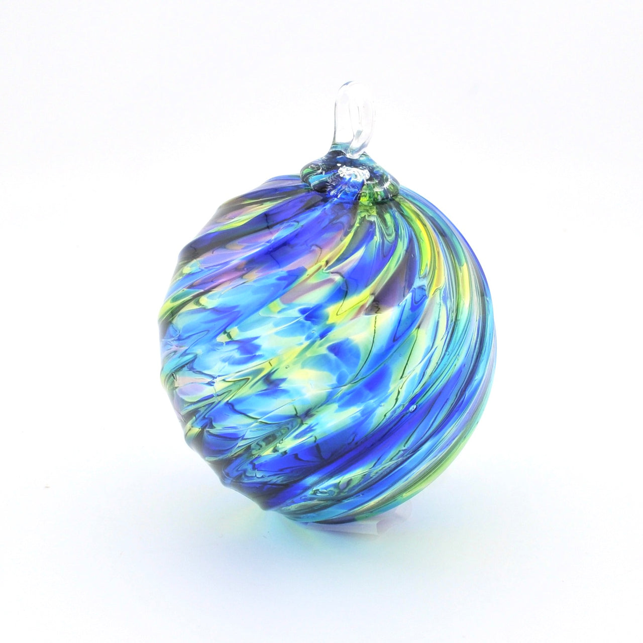 Colorful glass ornament on a white background