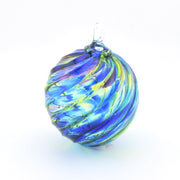Colorful glass ornament on a white background
