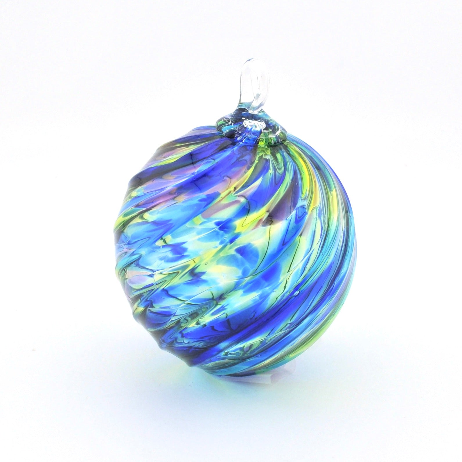 Colorful glass ornament on a white background