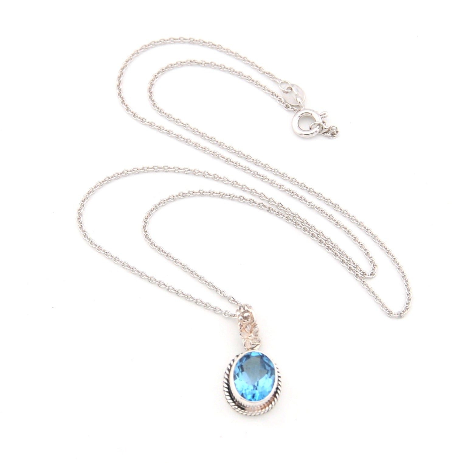 Necklace with a blue pendant on a white background