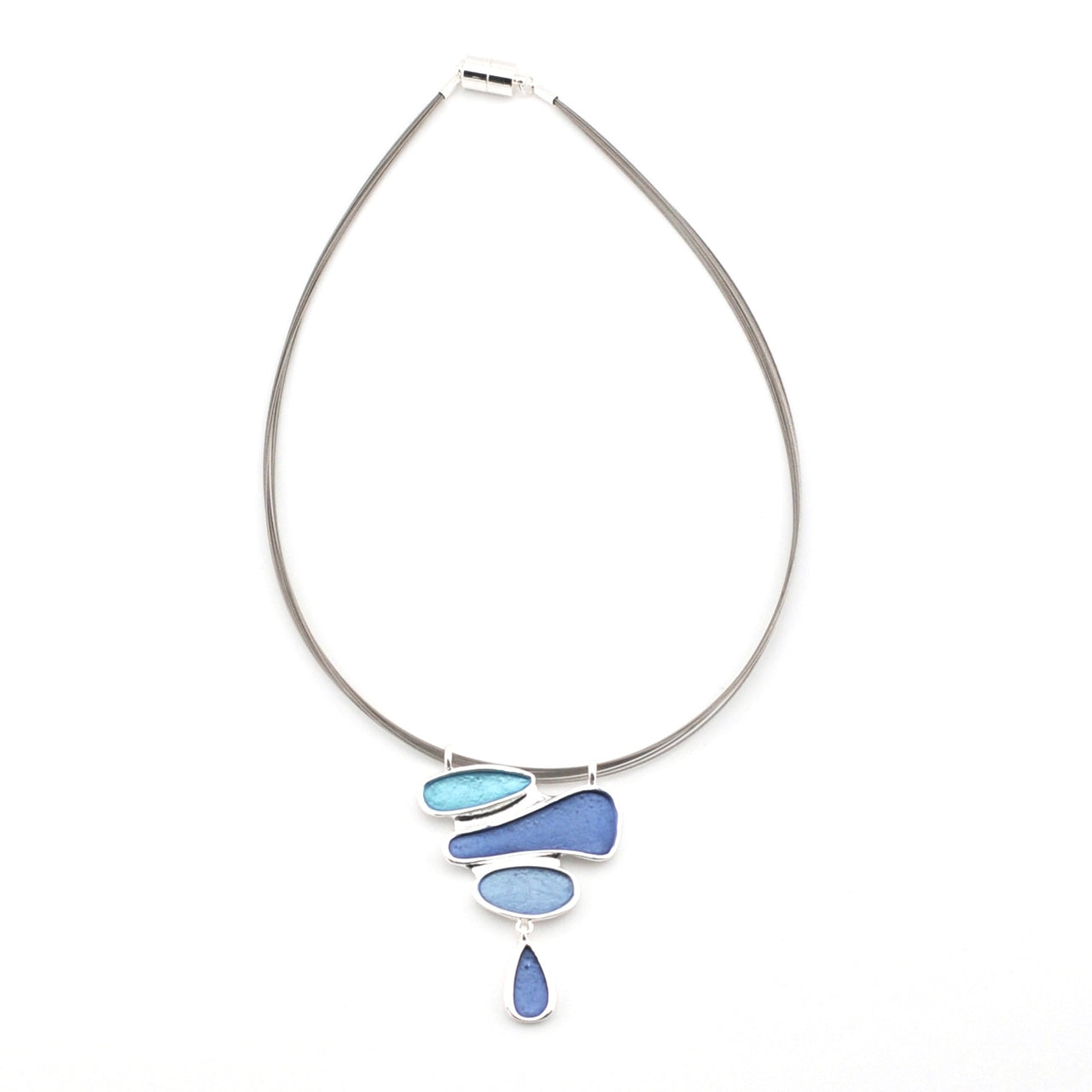 Silver necklace with blue pendant on a white background