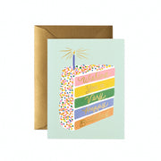 Greeting card with a colorful birthday cake illustration and gold envelope on a white background