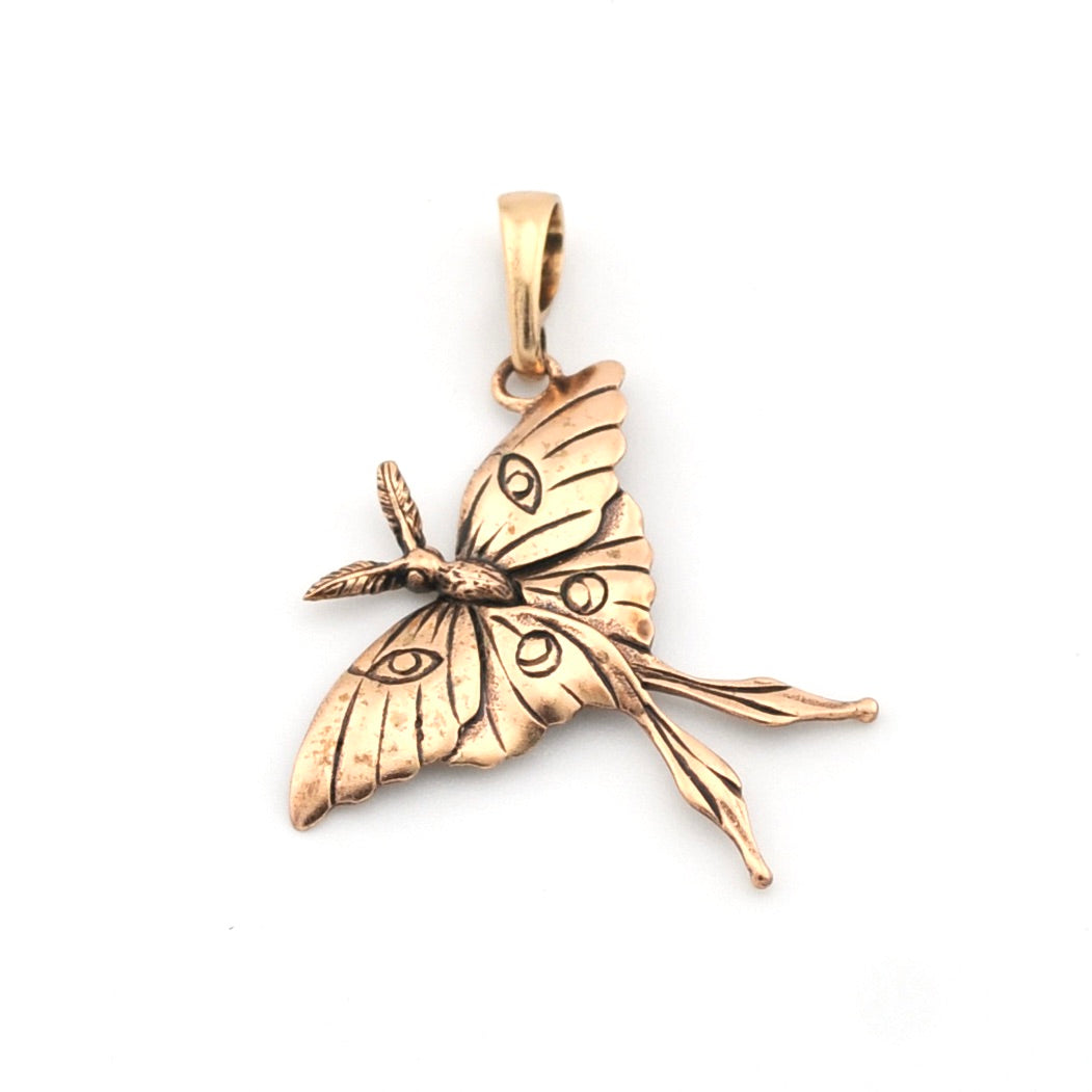 Bronze butterfly pendant on a white background