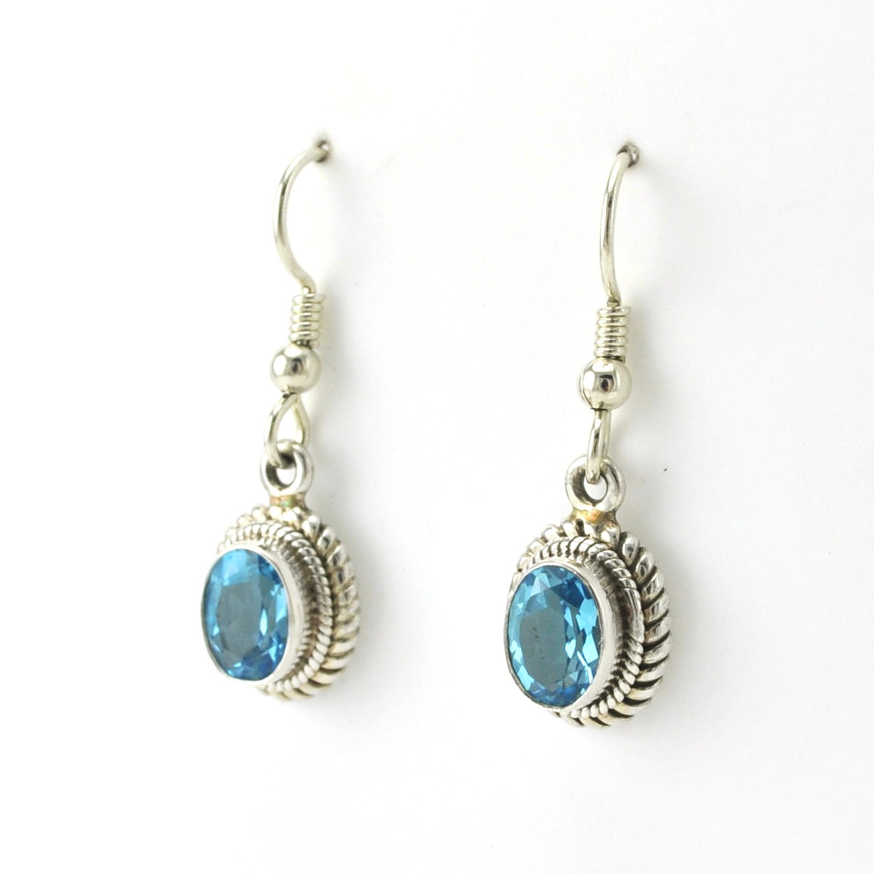 Side View Sterling Silver Blue Topaz 6x8mm Oval Dangle Earrings